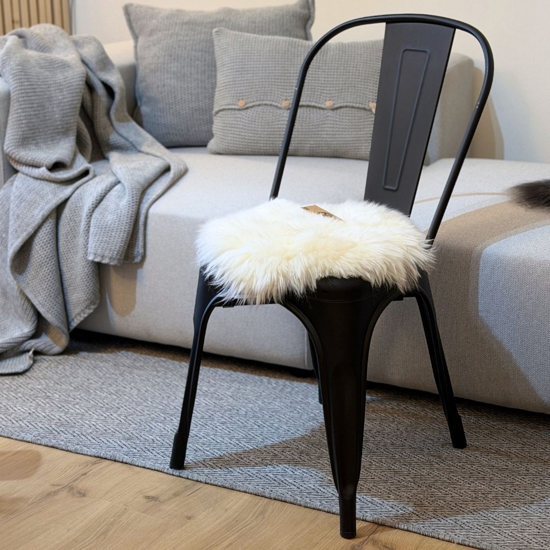 Coprisedia circolare in vera pelle di pecora australiana di colore bianco